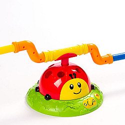 Іграшка 2-в-1 Музична Божа корівка від Fat Brain Toys