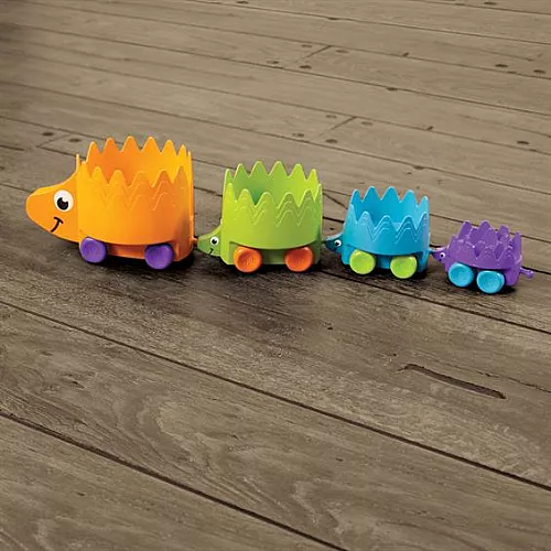 Розвиваюча іграшка каталка пірамідка Їжачки (4 шт) від Fat Brain Toys Розвиваюча іграшка каталка пірамідка Їжачки (4 шт) від Fat Brain Toys