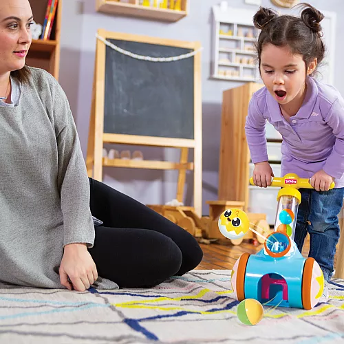 Розвиваюча іграшка каталка з кульками від Toomies