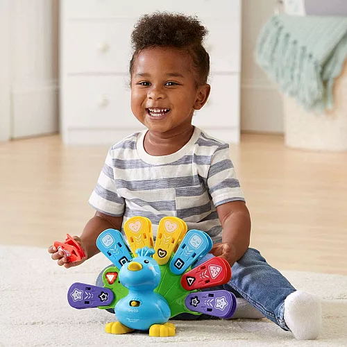 Развивающая музыкальная игрушка Павлин от VTech Развивающая музыкальная игрушка Павлин от VTech